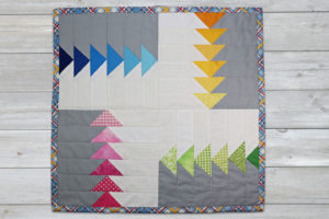 flying geese abstract quilted table topper or hanging quilt
